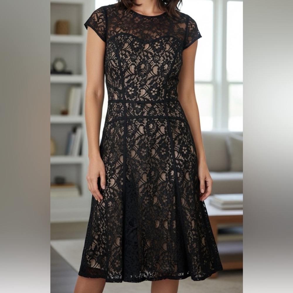 BCBGMAXAZRIA Black Lace Fit & Flare Dress
A timeless LBD size XXS